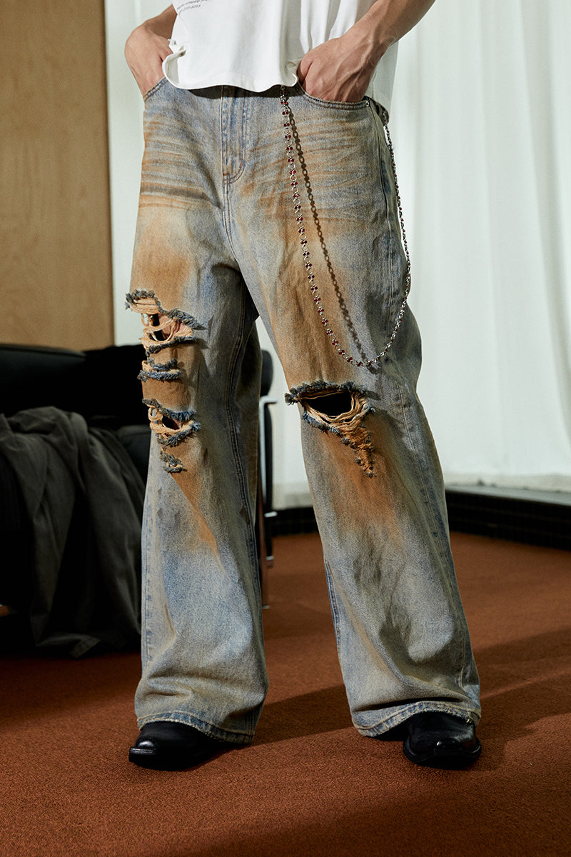 Mud-Dyed Distressed Washed Jeans