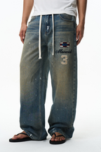 Splatter Embroidered Drawstring Jeans
