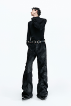 Waxed Distressed Flare Jeans