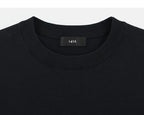Black sweater neckline detail