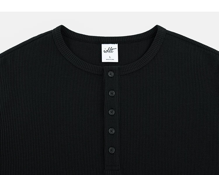 Black waffle Henley neckline and placket