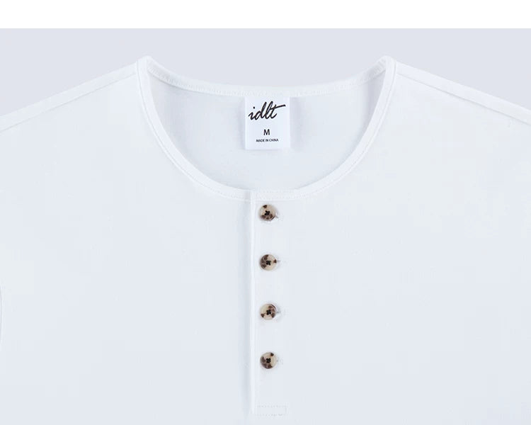 White Henley neckline and button placket