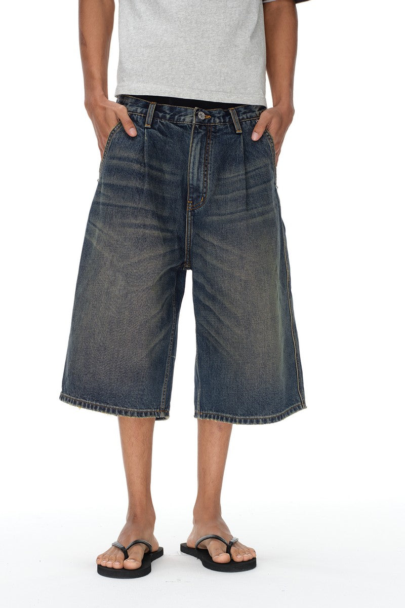 Distressed Pleated Denim Shorts