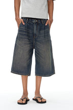 Distressed Pleated Denim Shorts