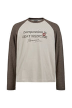 Vintage Raglan Graphic Longsleeve — Light Apricot front