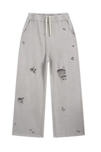 Snow Wash Ripped Jeans