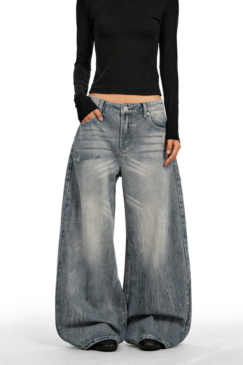 Distressed Curved Leg Jeans - Blue