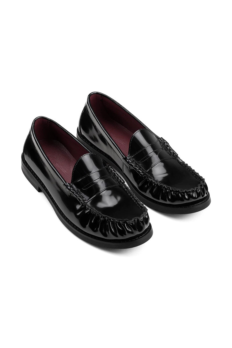 Glossy Gathered Leather Loafers - Black - three-quarter pair view