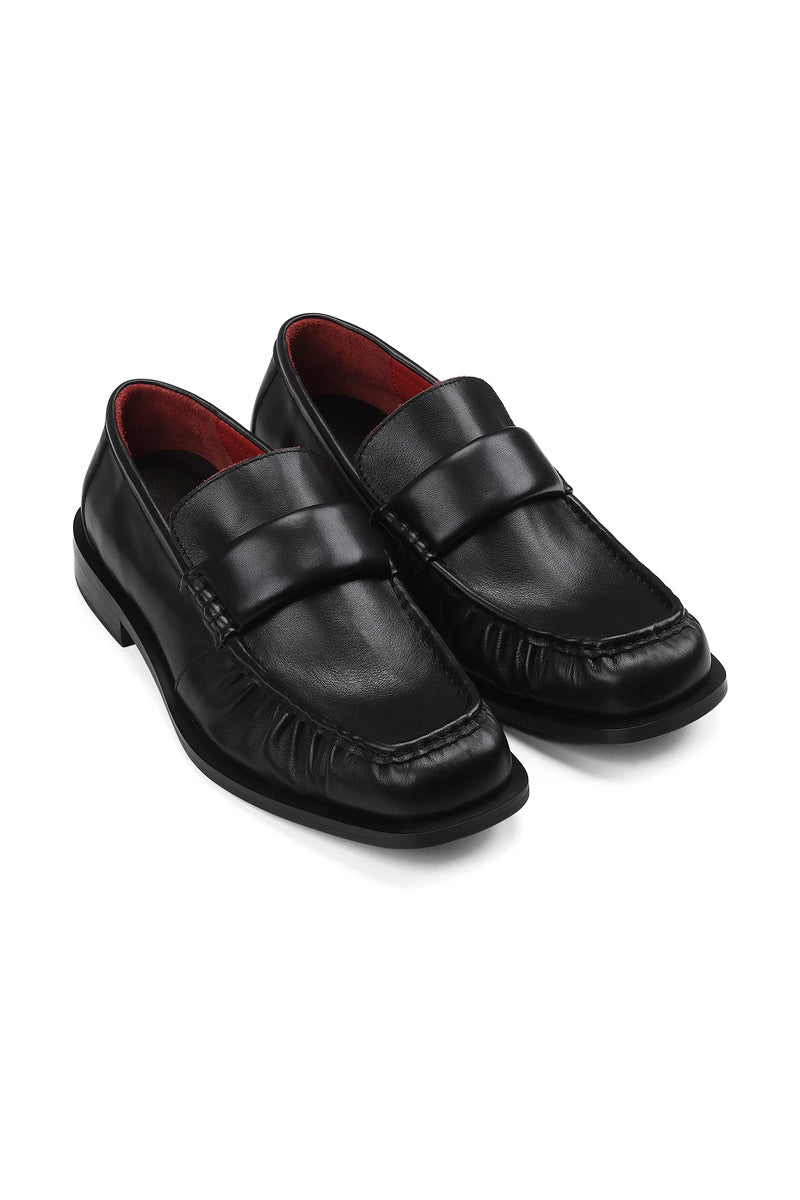 Wrinkled Calfskin Penny Loafers - Black - three-quarter pair view