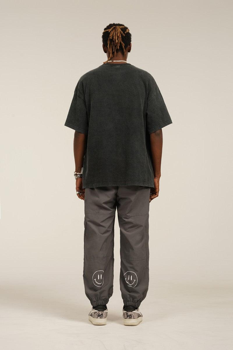 Empty Reference Smiley Logo Casual Pants