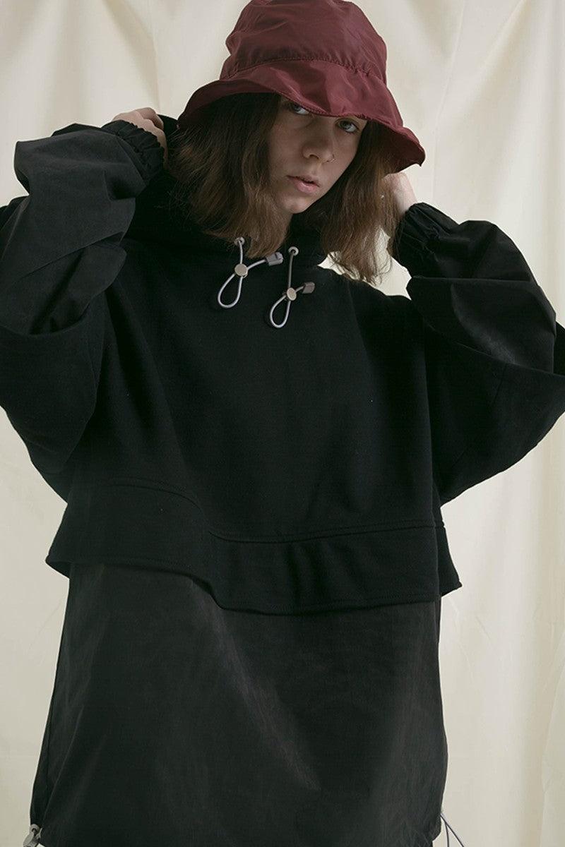 Center of Rotation Stitched Hooded Sweater